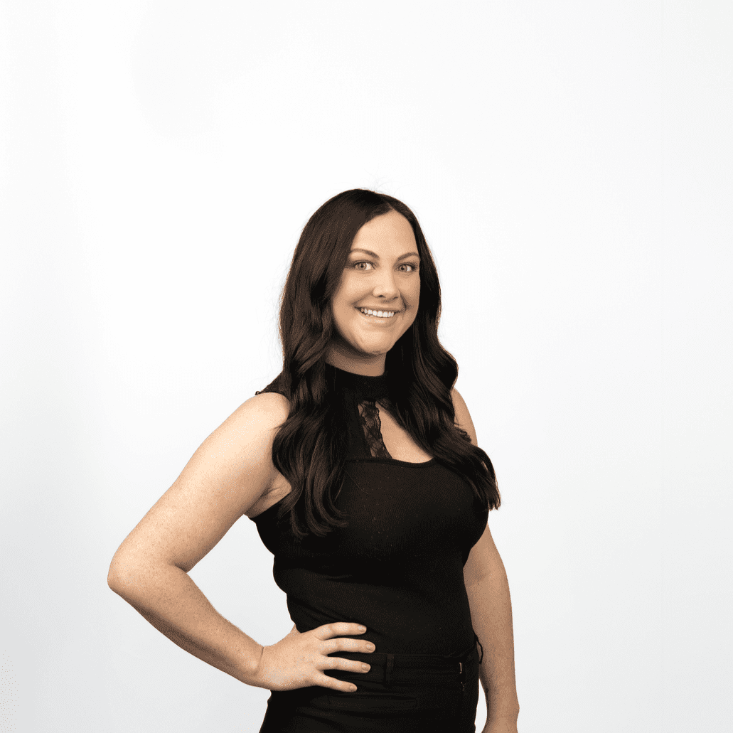 Portrait of Jena, a professional stylist at Salon Lux LLC, showcasing their expertise and style.