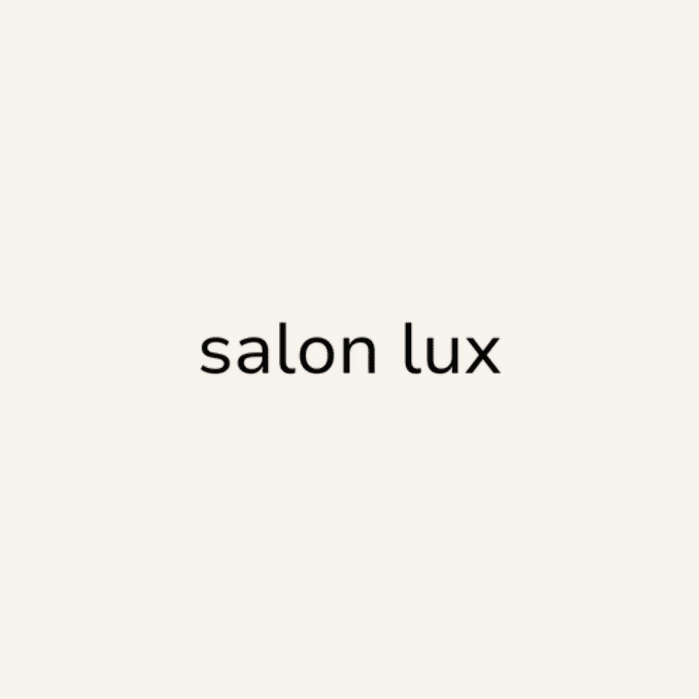 Portrait of Ava, a professional stylist at Salon Lux LLC, showcasing their expertise and style.