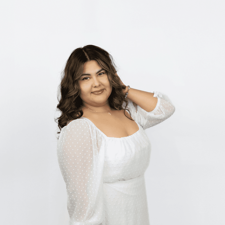 Portrait of Kim, a professional stylist at Salon Lux LLC, showcasing their expertise and style.