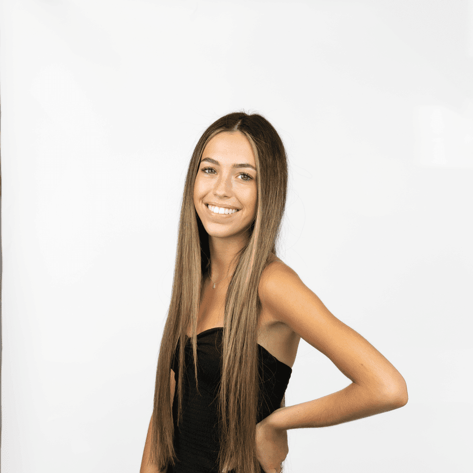 Portrait of Alyssa S, a professional stylist at Salon Lux LLC, showcasing their expertise and style.